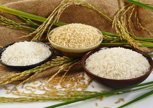 Different rice varieties in bowls.